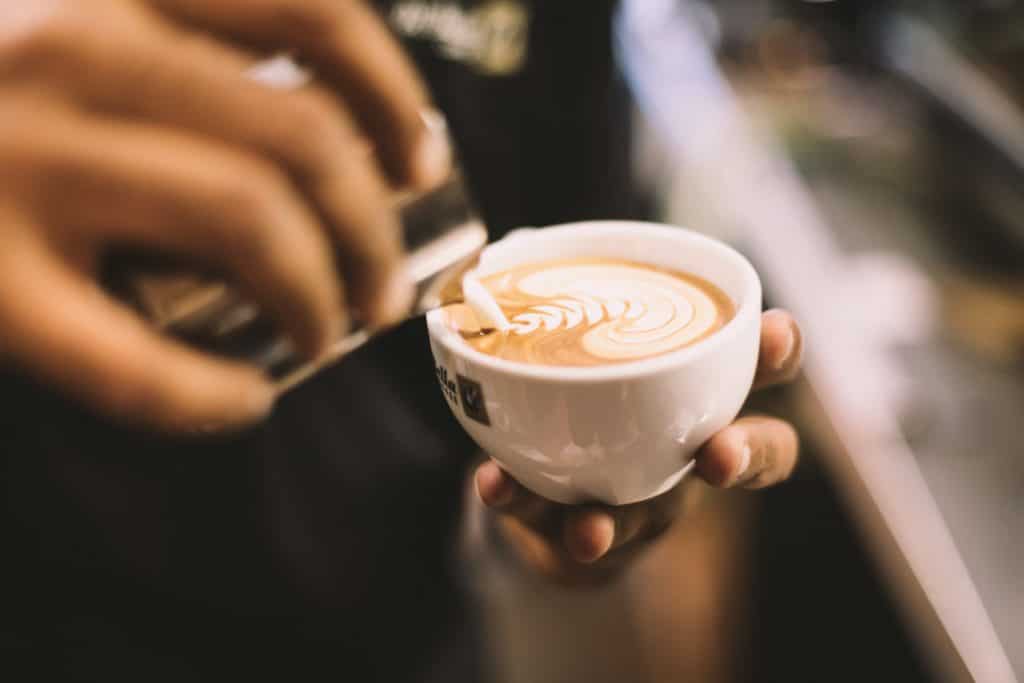 Pouring Milk in a Cappuccino